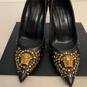 Used Original Versace black heels.